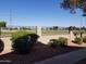 Backyard with a golf course view and privacy wall at 8140 N 107Th Ave # 129, Peoria, AZ 85345