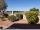 Landscaped backyard with a view of a golf course at 8140 N 107Th Ave # 129, Peoria, AZ 85345