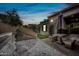 Outdoor kitchen and patio furniture in a backyard at 9238 E Desert Park Dr, Scottsdale, AZ 85255