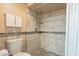 Updated bathroom with shower and toilet at 1714 W Marlette Ave, Phoenix, AZ 85015