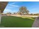 Artificial turf backyard with golf course view at 19039 N 90Th Ln, Peoria, AZ 85382