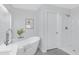 Spa-like bathroom featuring a soaking tub and a walk-in shower at 19039 N 90Th Ln, Peoria, AZ 85382