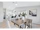 Dining area next to a kitchen with a large island at 19039 N 90Th Ln, Peoria, AZ 85382