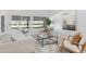 Living room with a view of the backyard and a neutral decor at 19039 N 90Th Ln, Peoria, AZ 85382