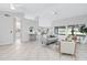 Open living room with high ceilings and access to the kitchen at 19039 N 90Th Ln, Peoria, AZ 85382