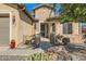 Stone and stucco exterior entryway with a walkway to the front door at 27046 W Yukon Dr, Buckeye, AZ 85396