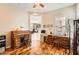 Home office with hardwood floors and view into Gathering room at 27046 W Yukon Dr, Buckeye, AZ 85396