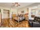 Main bedroom with hardwood floors and access to the bathroom at 27046 W Yukon Dr, Buckeye, AZ 85396