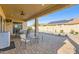 Covered patio with seating area, great for outdoor dining at 27046 W Yukon Dr, Buckeye, AZ 85396