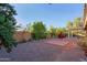Landscaped backyard with gravel, tile patio, and plants at 3846 N Kings Peak --, Mesa, AZ 85215