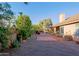 Spacious backyard with gravel, tile patio, and plants at 3846 N Kings Peak --, Mesa, AZ 85215