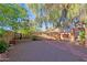 Landscaped backyard with gravel, stone path, and plants at 3846 N Kings Peak --, Mesa, AZ 85215