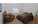 Cozy bedroom with comfortable seating and large window at 3846 N Kings Peak --, Mesa, AZ 85215