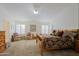 Primary bedroom with wood bed frame and access to bathroom at 3846 N Kings Peak --, Mesa, AZ 85215
