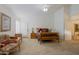 Primary bedroom with wood bed frame and sitting area at 3846 N Kings Peak --, Mesa, AZ 85215