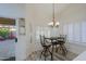Cozy breakfast nook with table and chairs, adjacent to patio at 3846 N Kings Peak --, Mesa, AZ 85215