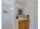 Wooden cabinet with decorative items and artwork at 3846 N Kings Peak --, Mesa, AZ 85215