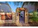 Charming entrance with Southwestern-style gate and stone pathway at 3846 N Kings Peak --, Mesa, AZ 85215