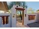 Unique Southwestern-style gate and walkway leading into the backyard at 3846 N Kings Peak --, Mesa, AZ 85215