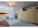 Garage with built-in shelving and extra storage at 3846 N Kings Peak --, Mesa, AZ 85215