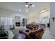 Open concept living area with a kitchen and fireplace at 3846 N Kings Peak --, Mesa, AZ 85215