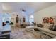 Open living and dining area with a large sectional sofa at 3846 N Kings Peak --, Mesa, AZ 85215
