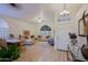 Bright living room with L-shaped sofa and wood floors at 3846 N Kings Peak --, Mesa, AZ 85215