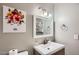 Bathroom with single sink and white vanity at 8310 E Devonshire Ave, Scottsdale, AZ 85251