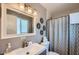 Clean bathroom with single sink and shower at 8310 E Devonshire Ave, Scottsdale, AZ 85251