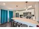 Modern kitchen with white cabinets and quartz countertops at 8310 E Devonshire Ave, Scottsdale, AZ 85251