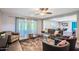 Open concept living area with access to a back patio at 8310 E Devonshire Ave, Scottsdale, AZ 85251