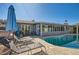 Relaxing pool area with lounge chairs and spa at 8310 E Devonshire Ave, Scottsdale, AZ 85251