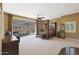 Spacious main bedroom with a large bed, patio access, and ample natural light at 1044 W Indian Hills Pl, Phoenix, AZ 85023