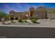 Two-story home with desert landscaping and driveway at 1044 W Indian Hills Pl, Phoenix, AZ 85023