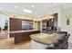 Modern kitchen with large island, stainless steel appliances, and granite countertops at 1044 W Indian Hills Pl, Phoenix, AZ 85023