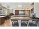 Spacious kitchen with granite countertops, stainless steel appliances, and ample cabinetry at 1044 W Indian Hills Pl, Phoenix, AZ 85023
