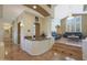 Open living area with a high ceiling, chandelier, and large windows at 1044 W Indian Hills Pl, Phoenix, AZ 85023