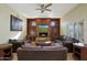 Relaxing living room featuring a fireplace and comfortable seating at 1044 W Indian Hills Pl, Phoenix, AZ 85023