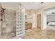 Large bathroom with walk-in shower and tile flooring at 14462 W Avalon Dr, Goodyear, AZ 85395