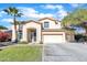 Two-story house with a large driveway and landscaping at 14462 W Avalon Dr, Goodyear, AZ 85395