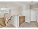 Upstairs hallway with built-in cabinets and stairs at 14462 W Avalon Dr, Goodyear, AZ 85395