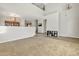 Spacious living room with a high ceiling and a cozy atmosphere at 14462 W Avalon Dr, Goodyear, AZ 85395