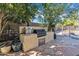 Built-in outdoor kitchen with grill and ample counter space at 14462 W Avalon Dr, Goodyear, AZ 85395