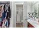 Clean bathroom with a shower, toilet, and double vanity at 3030 S Alma School Rd # 12, Mesa, AZ 85210
