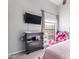 Bedroom with double bed, large window, and toy storage at 3030 S Alma School Rd # 12, Mesa, AZ 85210