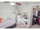 Bedroom with a double bed, vanity, and large closet at 3030 S Alma School Rd # 12, Mesa, AZ 85210