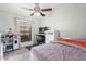 Bedroom with double bed, window, and toy storage at 3030 S Alma School Rd # 12, Mesa, AZ 85210