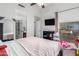 Bedroom with a double bed, TV, and changing table at 3030 S Alma School Rd # 12, Mesa, AZ 85210