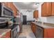 Modern kitchen with stainless steel appliances and ample cabinet space at 3030 S Alma School Rd # 12, Mesa, AZ 85210