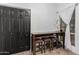 Breakfast bar with dark wood countertop and three brown stools at 3030 S Alma School Rd # 12, Mesa, AZ 85210